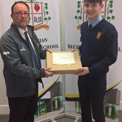 Old Connell Stud's David Brophy presents Cian Dowling with his prize of a new laptop sponsored by Darley