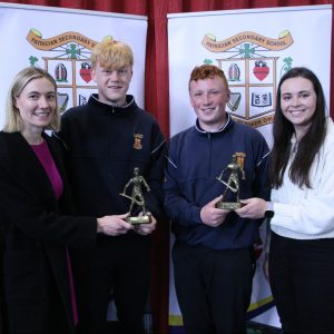 Junior Hurling Award winners, Alex Bell & Aaron Donnelly with Natalya Coyle & Ms Murphy