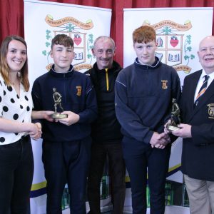 Junior Rugby Award winners, Louis Malone & Eoin Carroll with Ms Lauriane Pitous, Mr McGrath & Newbridge Rugby President, Ollie Delaney