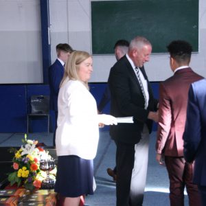 Mr Moloney & Ms Martin present the Graduation Certs