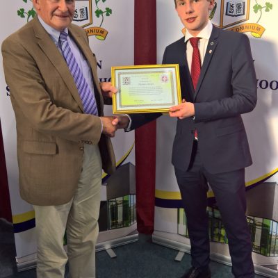 Pastoral Award winner Thomas Keyes with Mr Seamus Mullooly 